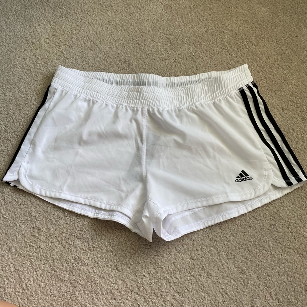 Woman’s adidas shorts.